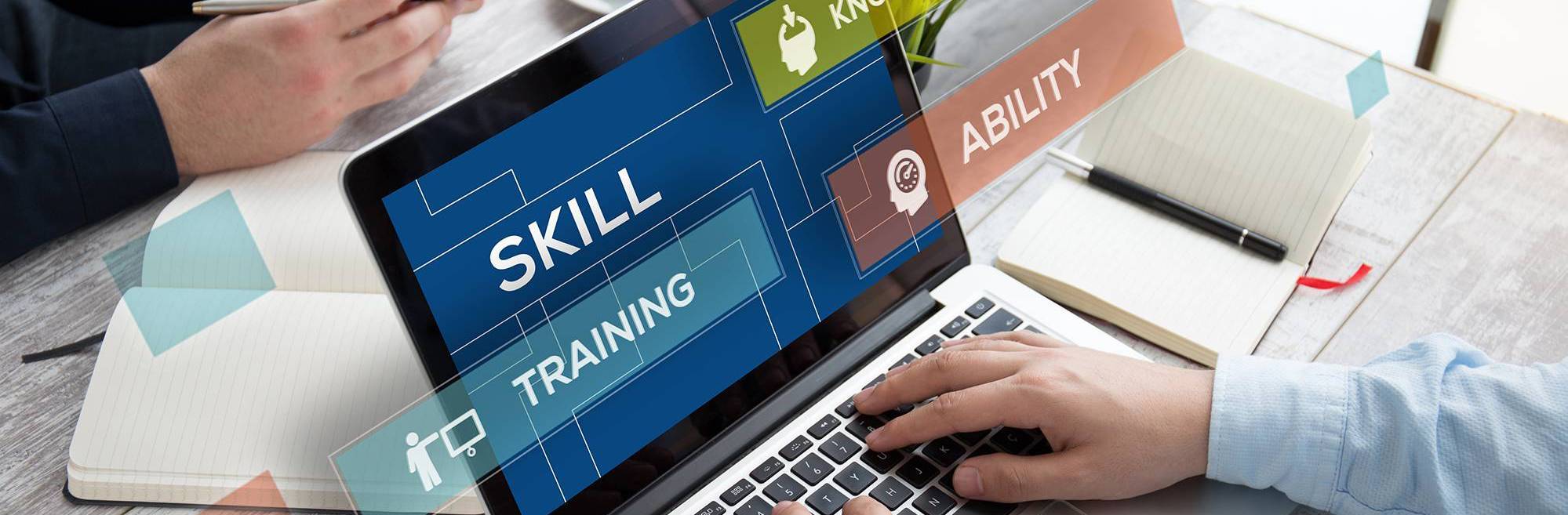 Skills, Knowledge, Training & Ability displayed on laptop